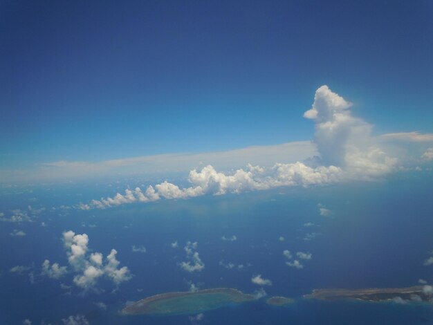 Aerial view of clouds over blue sky