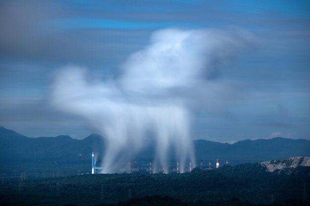 Photo aerial view coal power plant station and steam in the morning mist mae moh lampang