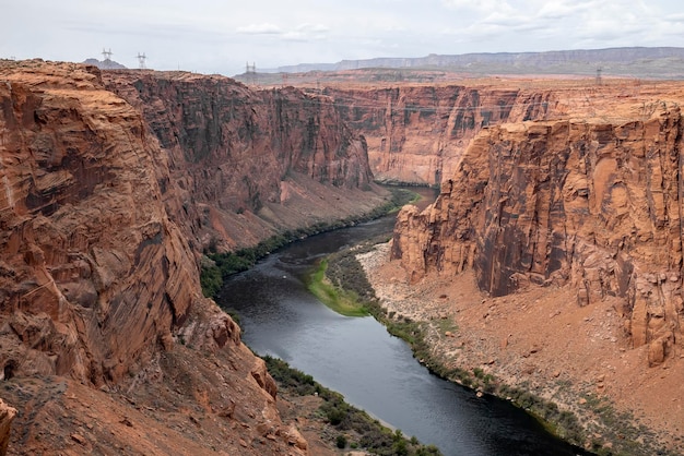 Aerial view of colorado river flowing at glen canyon dam