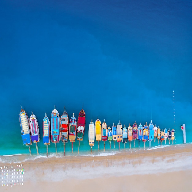 Aerial view of colorful boats in mediterranean sea