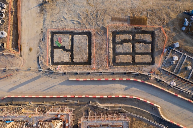 Aerial view over a construction site of new homes being built