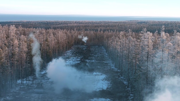 Aerial view of construction site in winter forest