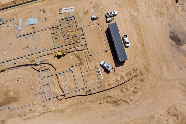 Aerial view on construction work in preparation process view of new residential district with apartment buildings