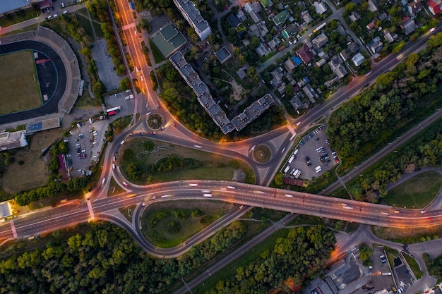 Aerial view of crossroads in a city in the evening