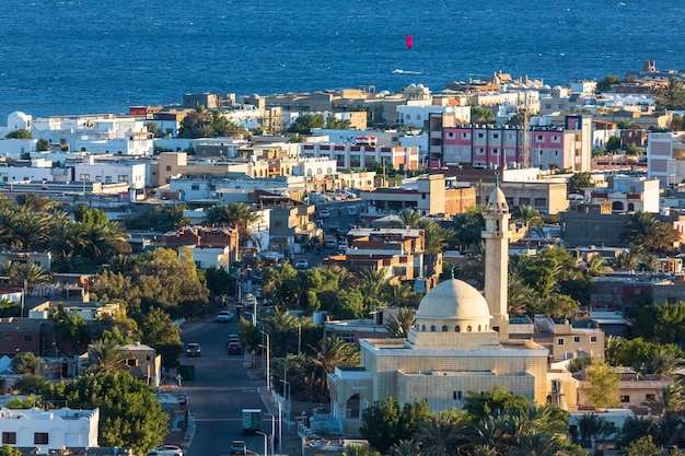 Aerial view of Dahab town and a mosque from the mountain nearby, South Sinai, Egypt