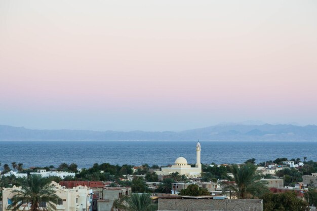 Aerial view of Dahab town and a mosque from the mountain nearby, South Sinai, Egypt