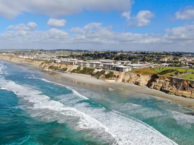 Aerial view of Del Mar North Beach, California coastal cliffs with Pacific ocean. San Diego