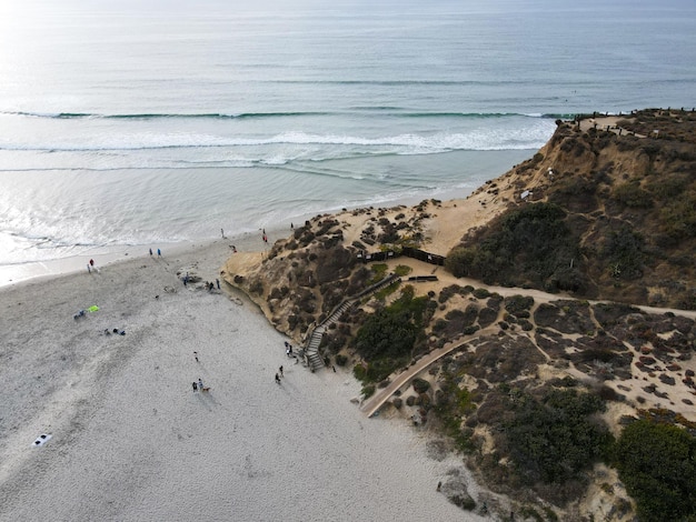 Aerial view of Del Mar North Beach, California coastal cliffs with Pacific ocean. San Diego