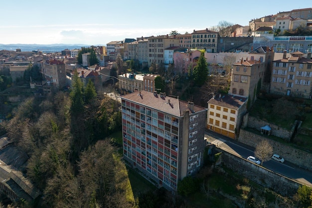 Aerial view of dense historic center of Thiers town in PuydeDome department AuvergneRhoneAlpes region in France Rooftops of old buildings and narrow streets