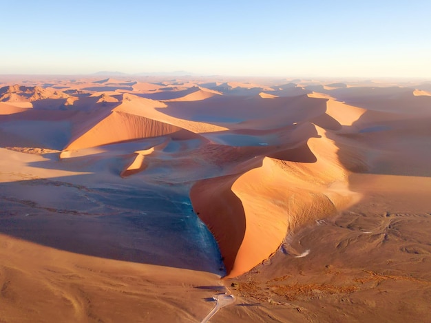 Photo aerial view of desert against sky