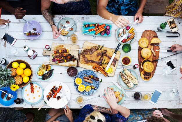 Aerial view of diverse friends gathering having food together