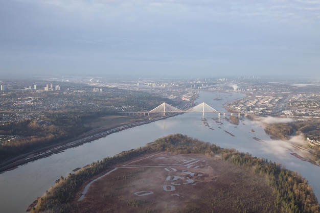 Aerial view on Douglas Island Fraser River and Port Mann Bridge