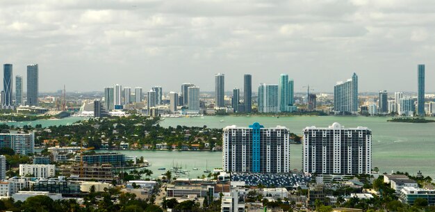 Aerial view of downtown office district of Miami in Florida USA on bright sunny day High commercial and residential skyscraper buildings in modern american megapolis