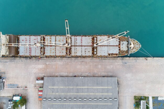 Aerial view drone shot of Container ship in export and import logistics