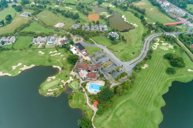 Aerial view drone Top down shot of beautiful green golf field High angle view in summer time