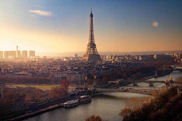 Aerial view of eiffel tower in city during sunset