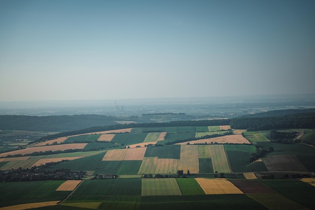 Aerial view of fields against sky