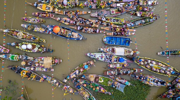 Aerial view floating festival in Thailand People enjoy the candle procession in the river ceremony The Buddhist Lent Day in Lad Chado Ayutthaya Thailand