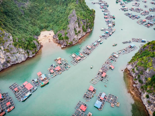 Aerial view of floating villages around Cat Ba islands Cat Ba is the largest of the 366 islands which make up the southeastern edge of Ha Long Bay in Vietnam