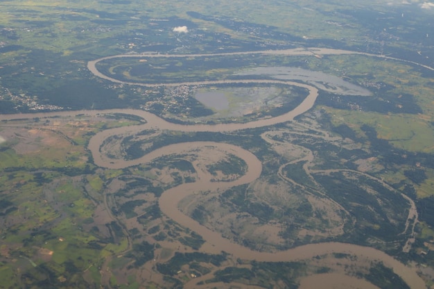 Aerial view of flood area in northeastern of thailand view from airplane window in the morning