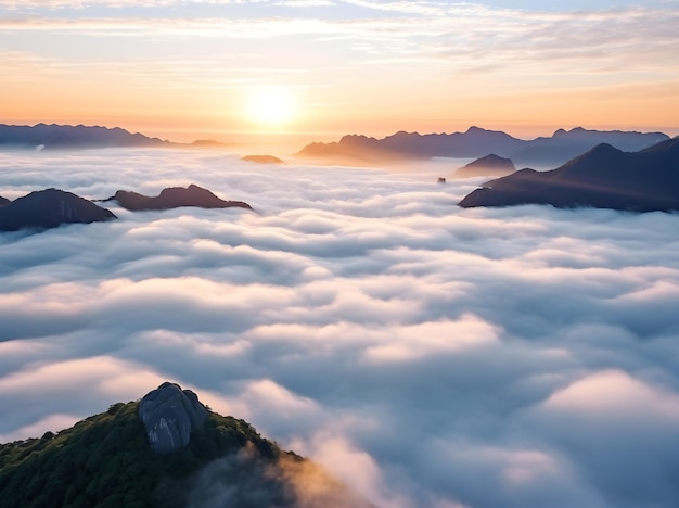 aerial view of fog over mountains in morning