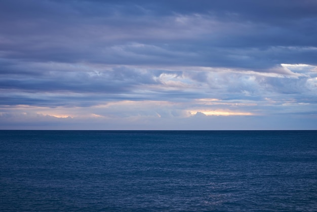 Aerial view from a flying drone of sunrise over sea