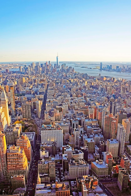 Aerial view from Observatory deck of the Empire State Building on Skyscrapers in Downtown Manhattan and Lower Manhattan, New York, USA.