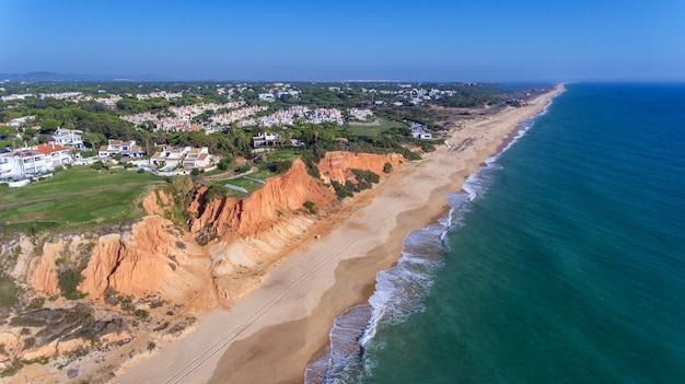 Aerial. View from the sky at the golf courses in the tourist town Vale de Lobo. Vilamoura.