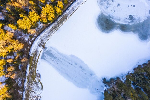 Aerial view of frozen lake from above