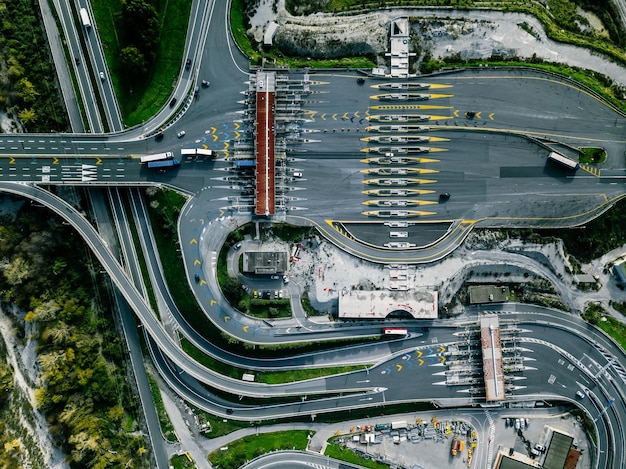 Aerial view gate for expressway fee payment in the city toll collection point on the motorway in Italy