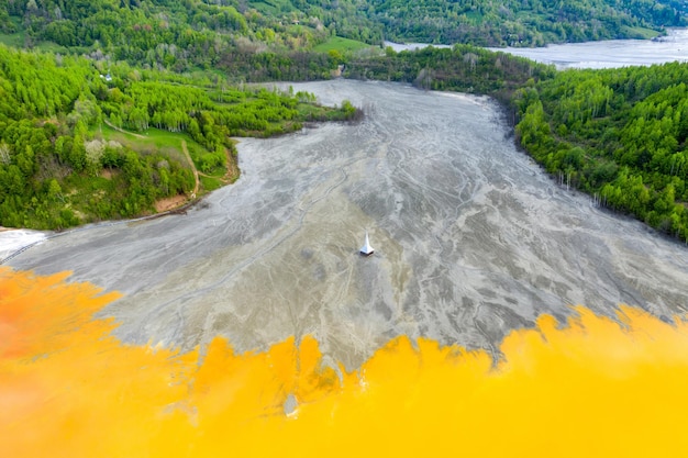 Aerial view of Geamana church flooded by mining waste water