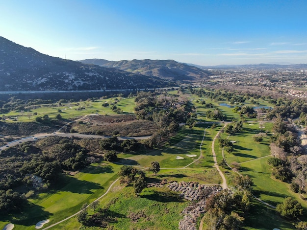 Aerial view of golf course with green field in the valley Green turf scenery Temecula California