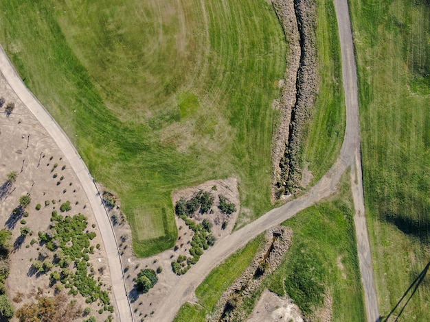 Photo aerial view over golf field. large and green turf golf course in south california. usa