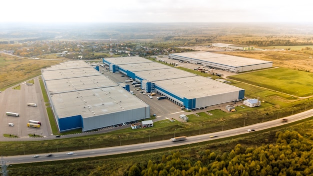 Aerial view of goods warehouse. Aerial view of industrial buildings and warehouse area.