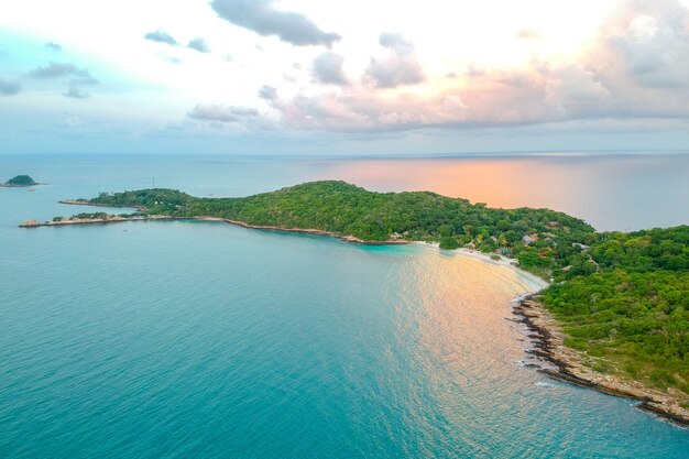 Aerial view of green island with beatiful sea sun light reflection, Kha Samet, Thailand