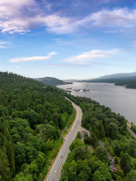 Aerial view of a highway in city cloudy sky