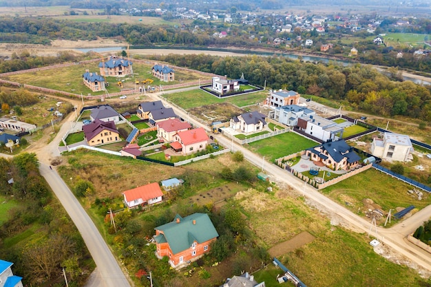 Aerial view of home roofs in residential rural neighborhood area.