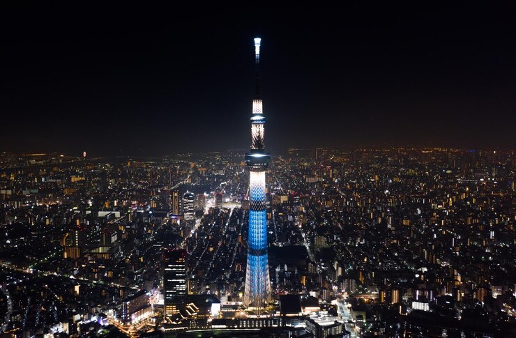 Photo 夜の街の照らされた建物の空中写真