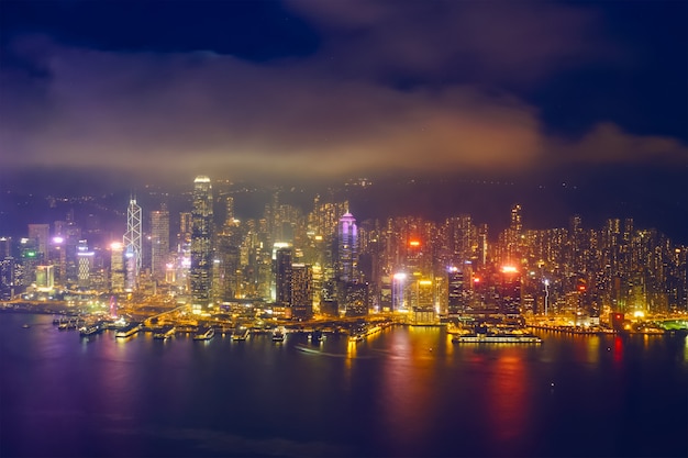 Aerial view of illuminated Hong Kong skyline. Hong Kong, China