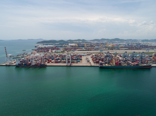 Aerial view of industrial port with containers, Large container vessel unloaded in Port