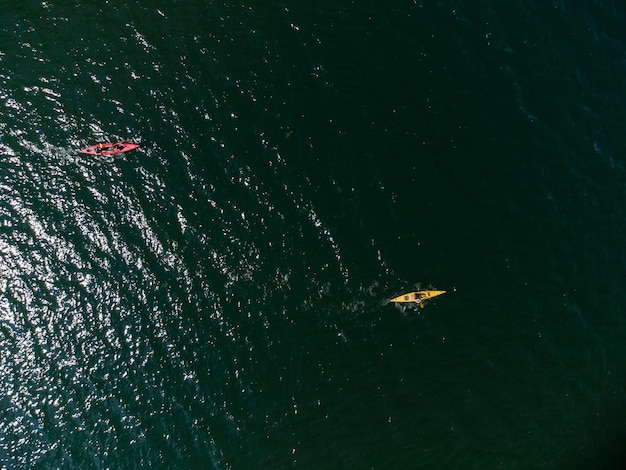 Aerial view of kayak on the lake in mountains