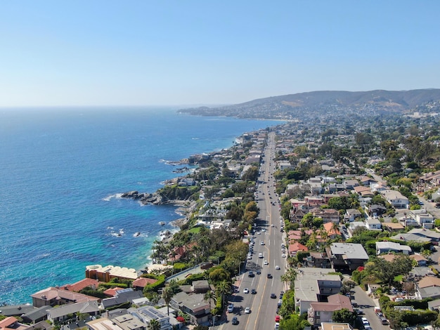 Aerial view of Laguna Beach coastline town with wealthy villas on the cliff Southern California USA