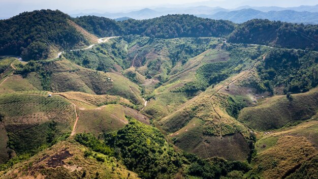 Aerial view landscape mountain valley and over road abstract background from drone camera 