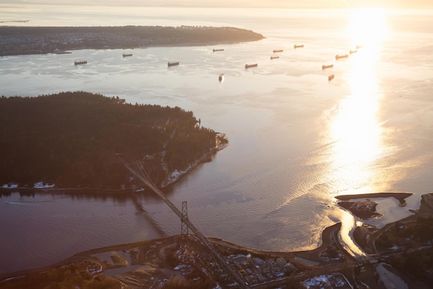 Aerial view of Lions Gate Bridge Stanley Park and Burrard Inlet