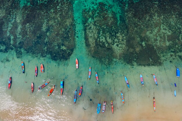 Aerial view of Long tail boats on the sea at Koh Tao island, Thailand