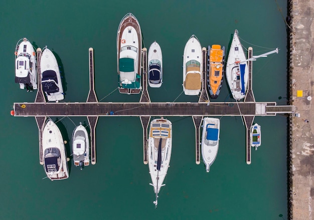 Aerial view of a lot of yachts and boats moored in marina