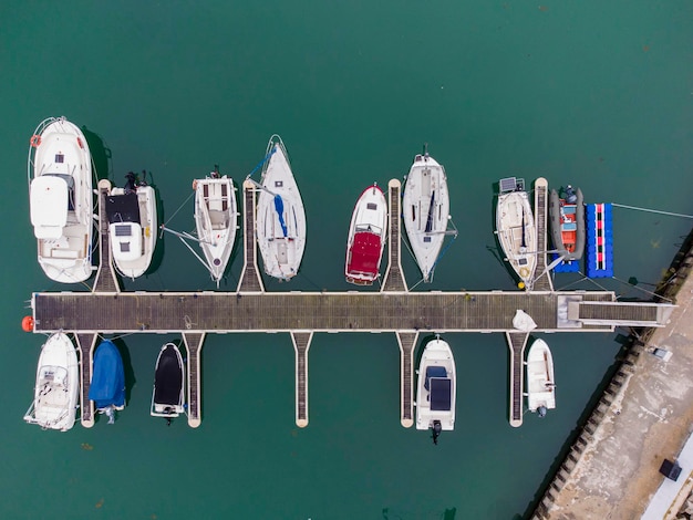 Aerial view of a lot of yachts and boats moored in marina