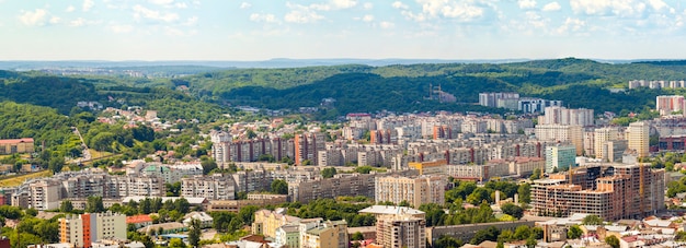 Aerial view of Lviv city. Panorama with modern buildings and urban space.