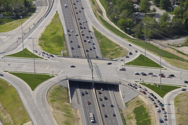 Photo aerial view of a major interstate highway cloverleaf and overpass in missouri
