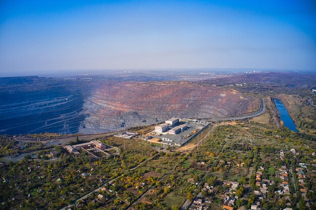 Aerial view of management building near a huge quarry at southern mining factory in Ukraine